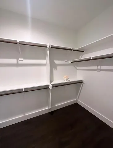 a view of an empty walk in closet