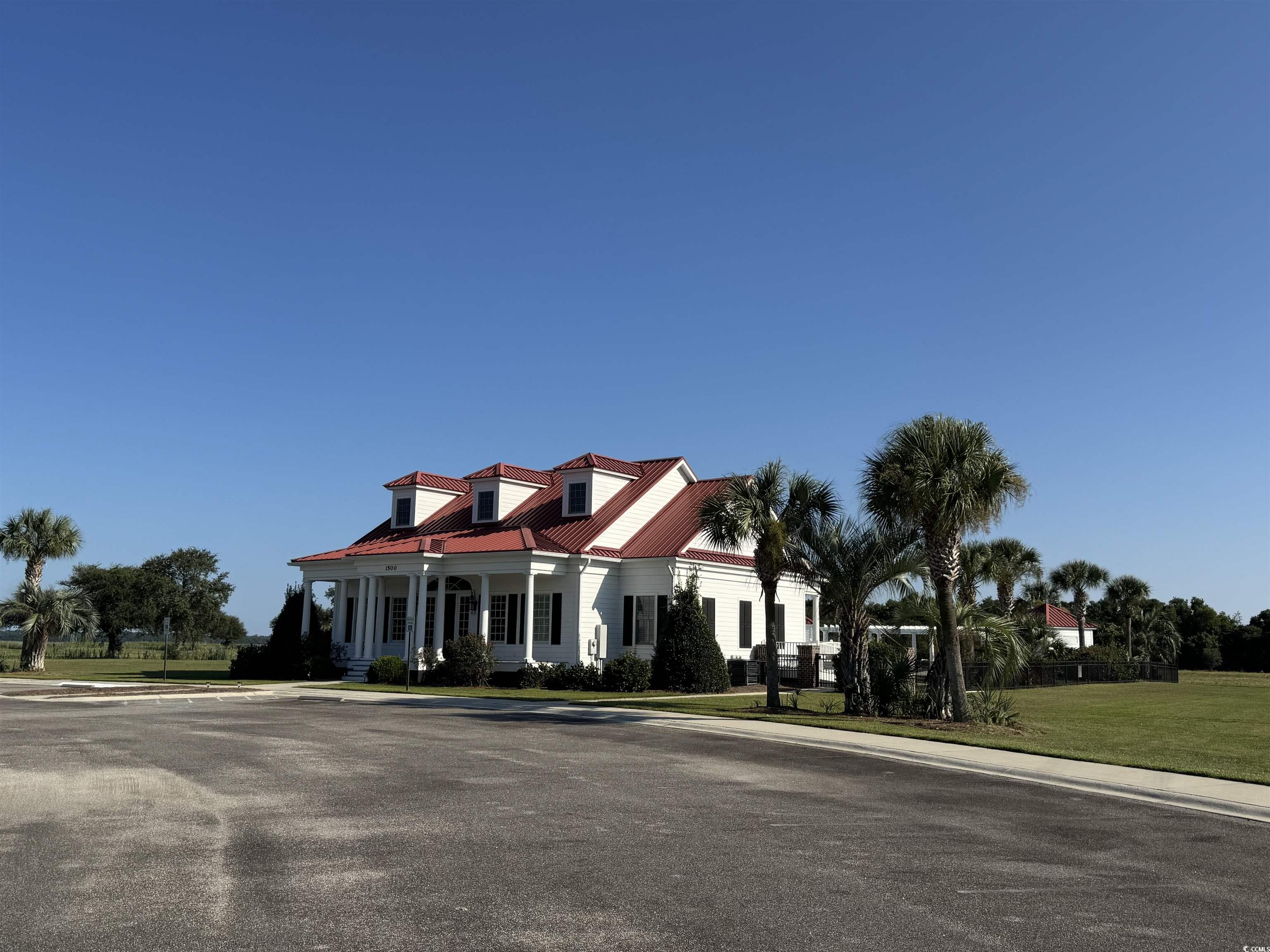 Lot 95 Cravens Street Georgetown, SC 29440 - Photo 10 of 17 Cape cod house featuring covered porch, a metal ro