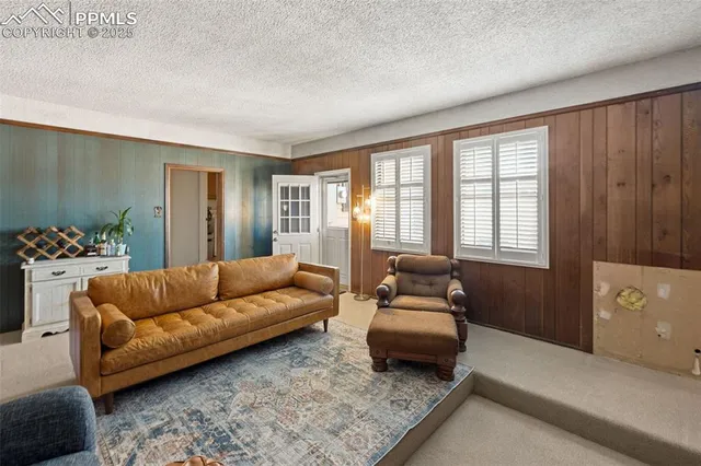 a living room with furniture and a couch