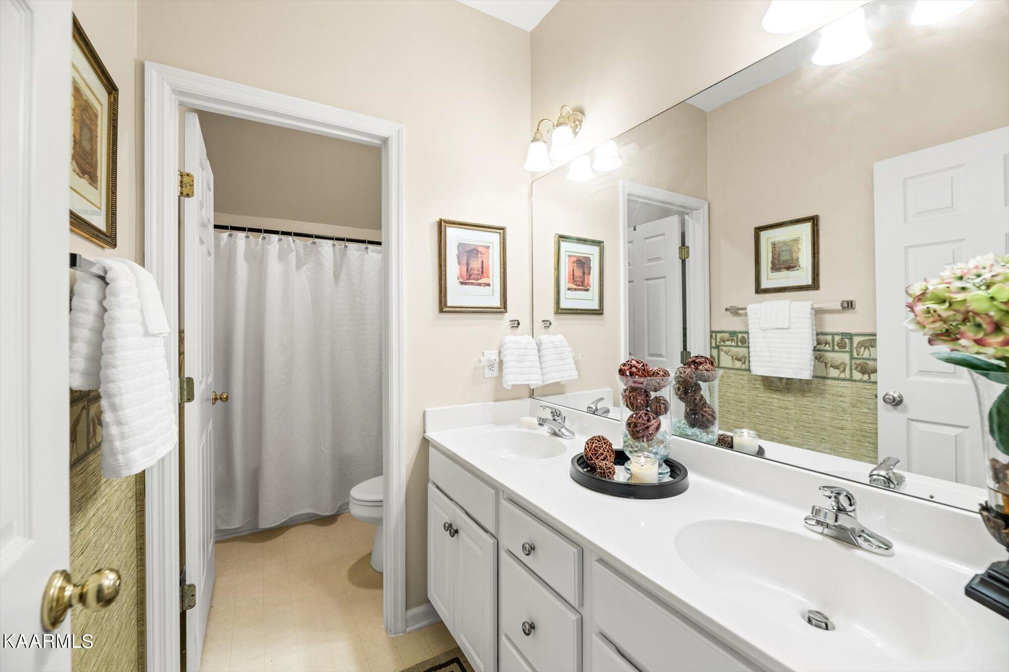 12718 Jarmann Road Knoxville, TN 37934 - Photo 26 of 41 Hall bath with two sinks