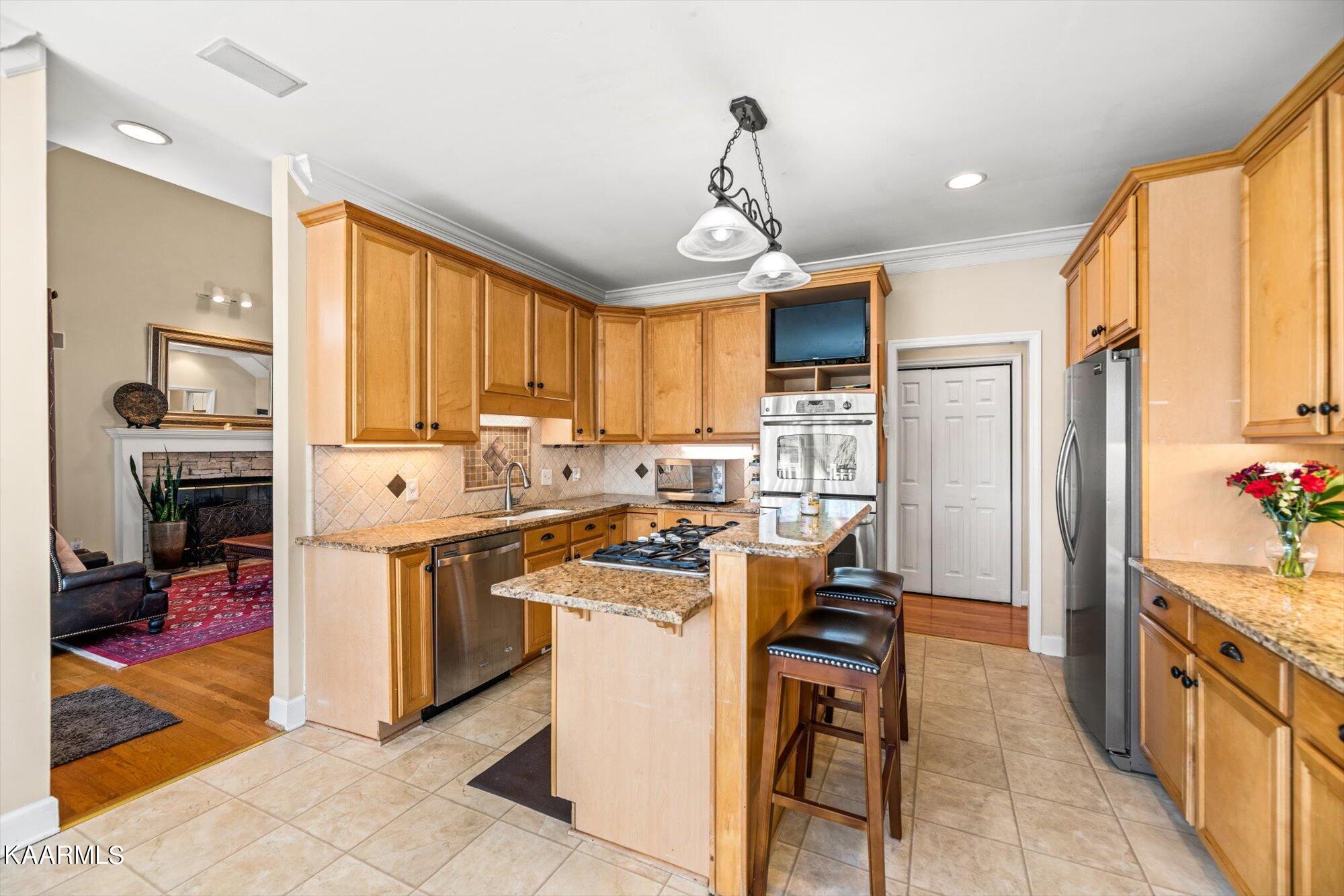 12718 Jarmann Road Knoxville, TN 37934 - Photo 8 of 41 Stone backspace and lots of cabinets
