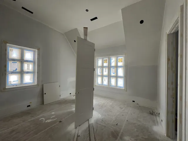 a view of a backyard of the house