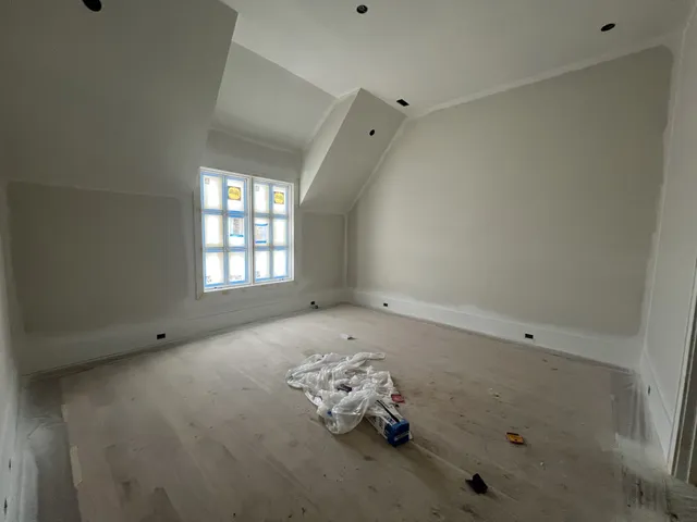a view of a swimming pool with outdoor seating