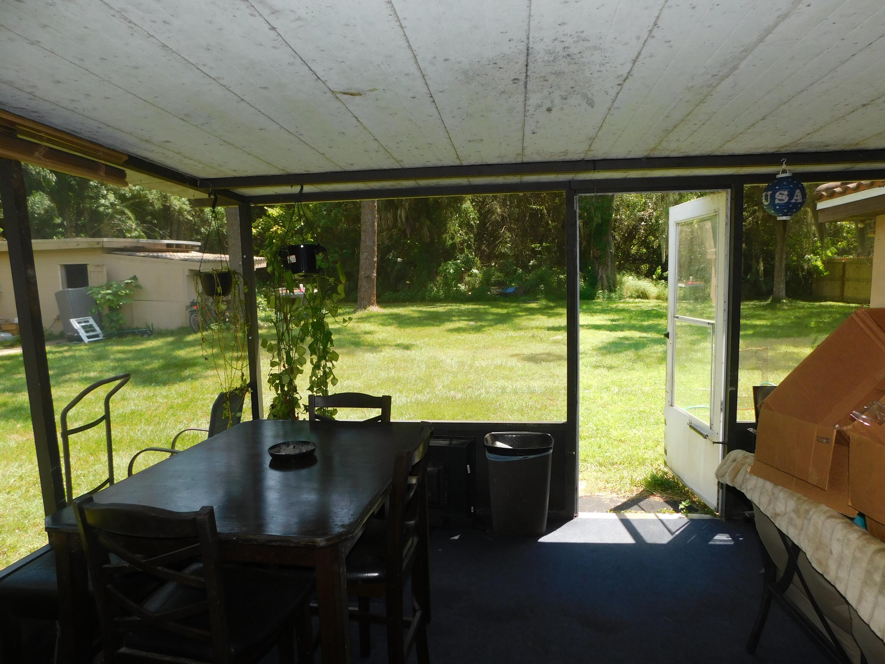 701 Ulrich Road Fort Pierce, FL 34982 - Photo 2 of 7 back porch1