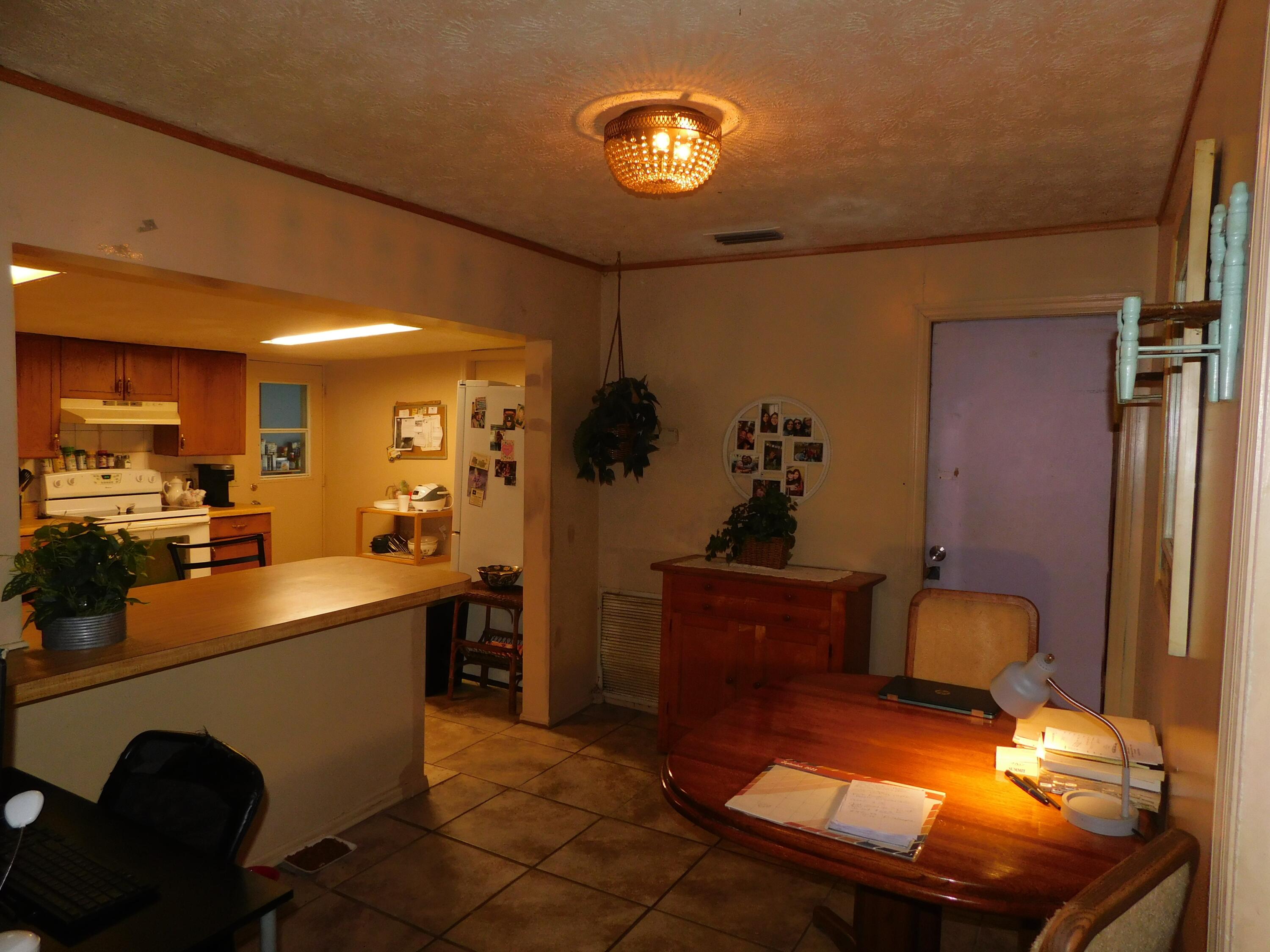 701 Ulrich Road Fort Pierce, FL 34982 - Photo 3 of 7 kitchen and dining