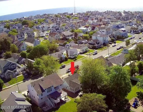 an aerial view of a house with a outdoor space
