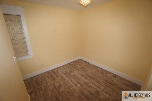 a view of small space with wooden floor