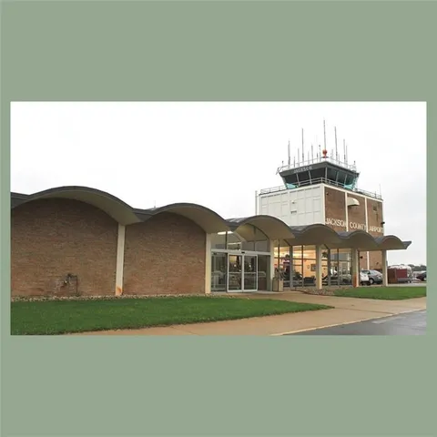 a view of a living room with furniture