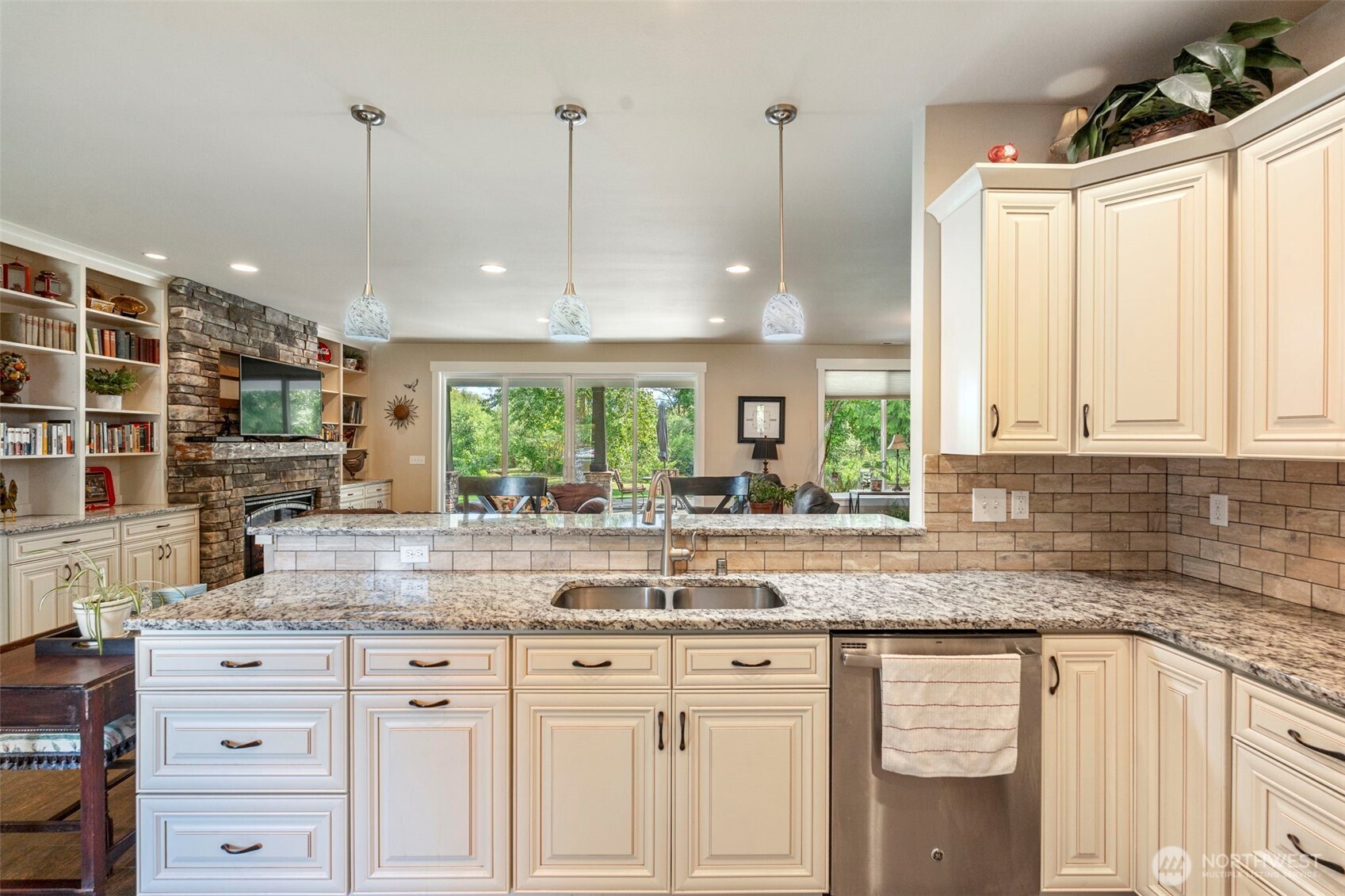2322 Rice Road Chehalis, WA 98532 - Photo 16 of 39 a kitchen with granite countertop a sink window and cabinets
