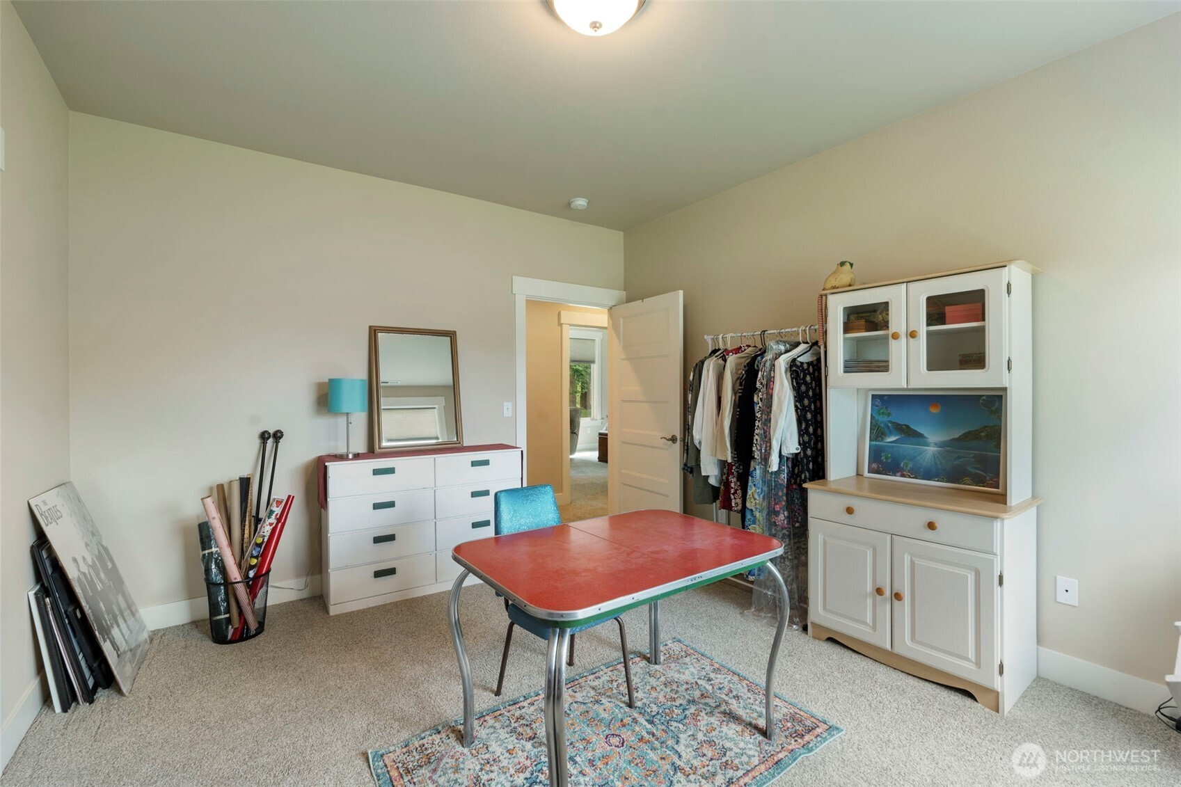 2322 Rice Road Chehalis, WA 98532 - Photo 22 of 39 a living room with furniture a rug and gym equipment