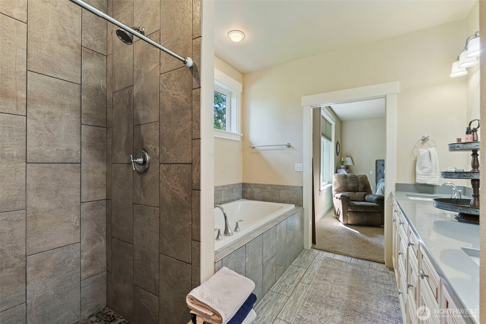 2322 Rice Road Chehalis, WA 98532 - Photo 30 of 39 a bathroom with a tub a sink a window and a shower