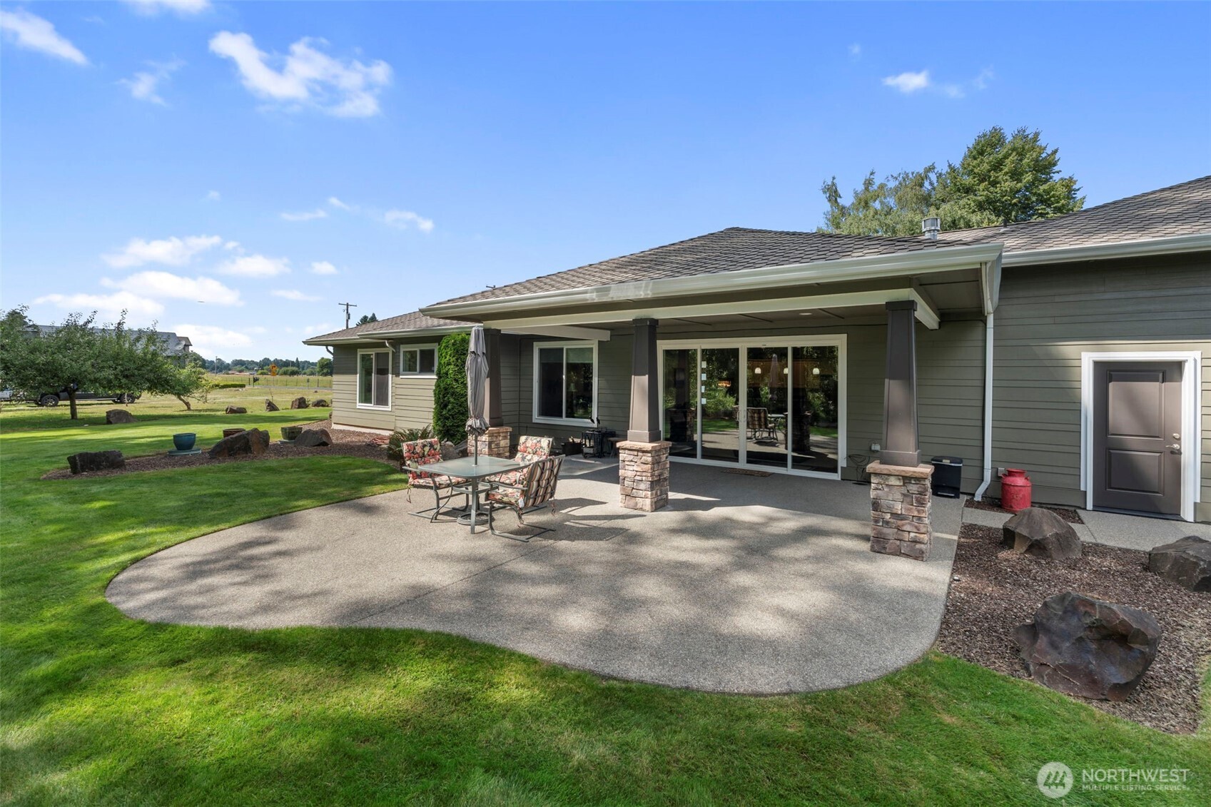 2322 Rice Road Chehalis, WA 98532 - Photo 35 of 39 a view of a house with backyard porch and sitting area