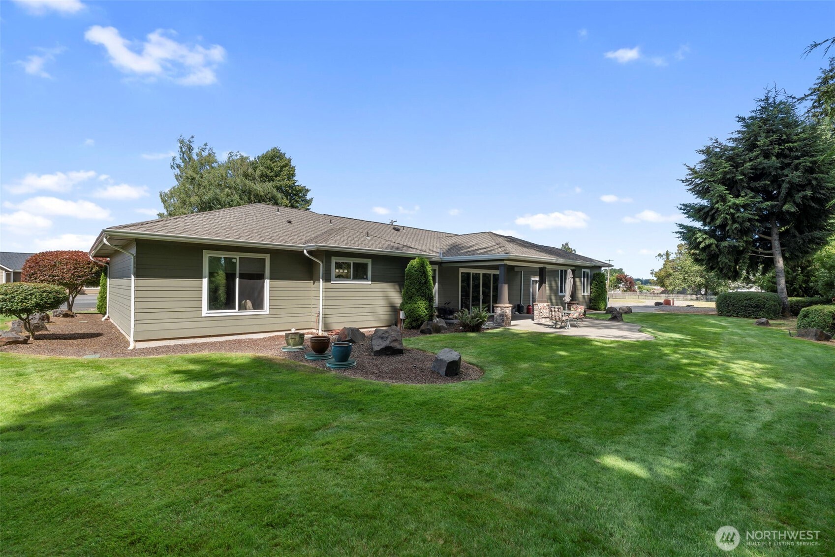 2322 Rice Road Chehalis, WA 98532 - Photo 6 of 39 a front view of a house with swimming pool having outdoor seating