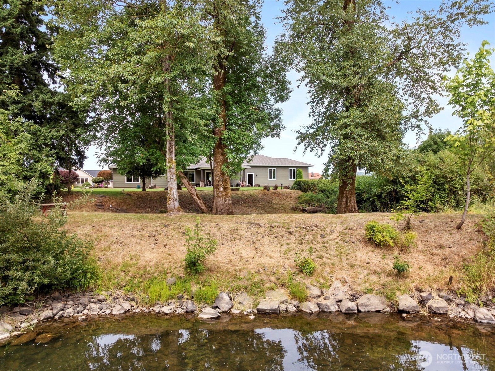 2322 Rice Road Chehalis, WA 98532 - Photo 7 of 39 a view of a yard with large trees