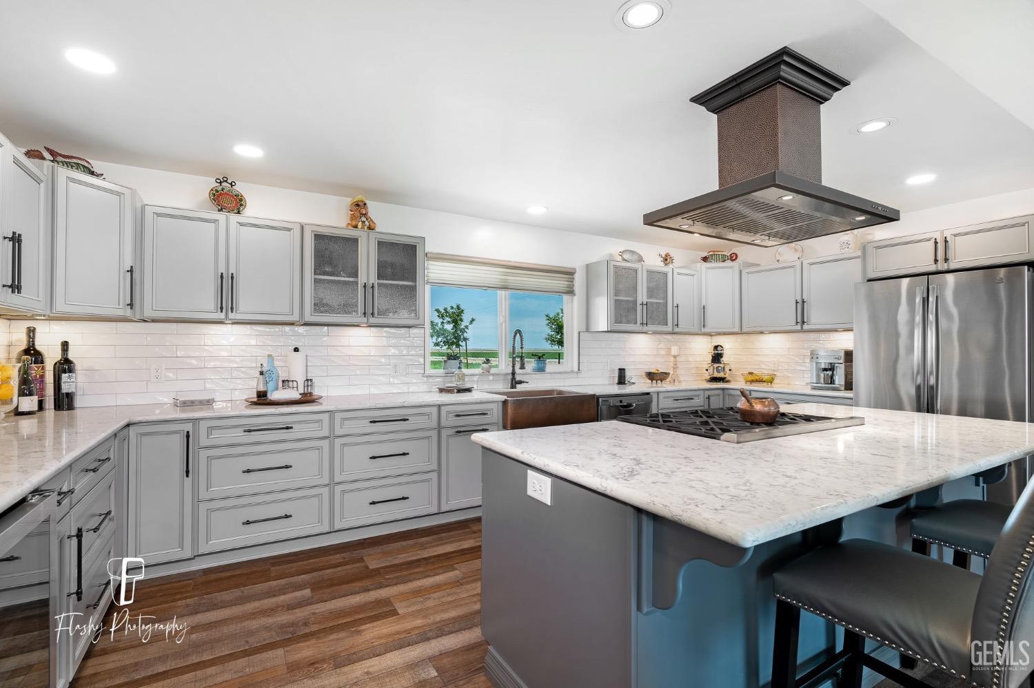 Undisclosed Address Buttonwillow, CA 93206 - Photo 17 of 65 a kitchen with a stove a refrigerator and a sink