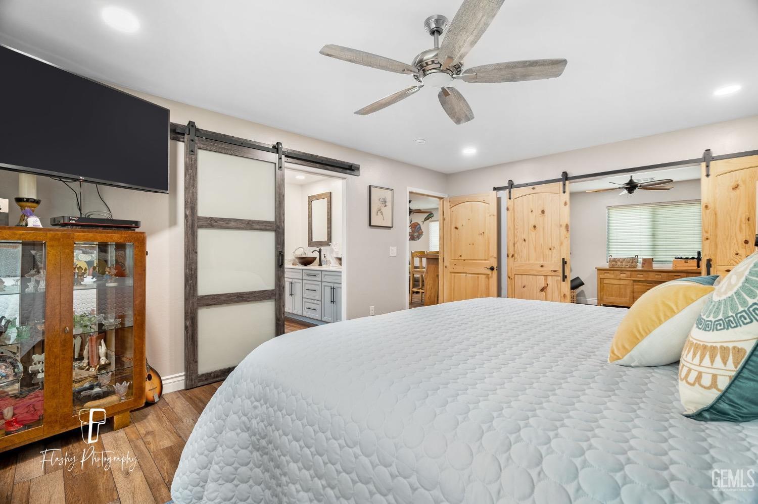 Undisclosed Address Buttonwillow, CA 93206 - Photo 23 of 65 a bedroom with a large bed and a window