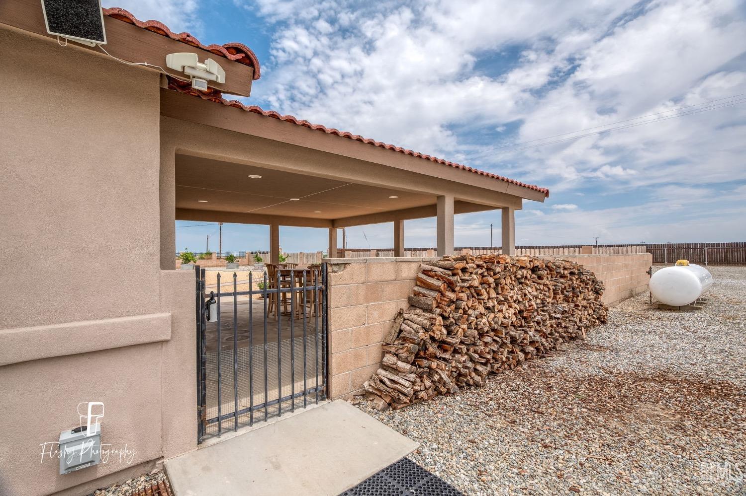 Undisclosed Address Buttonwillow, CA 93206 - Photo 39 of 65 a roof deck view with table and chairs