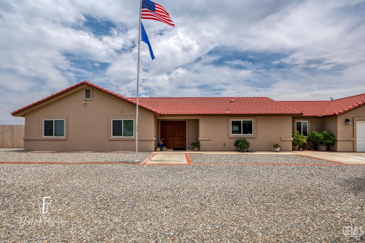 Undisclosed Address Buttonwillow, CA 93206 - Photo 4 of 65 a house view with a outdoor space