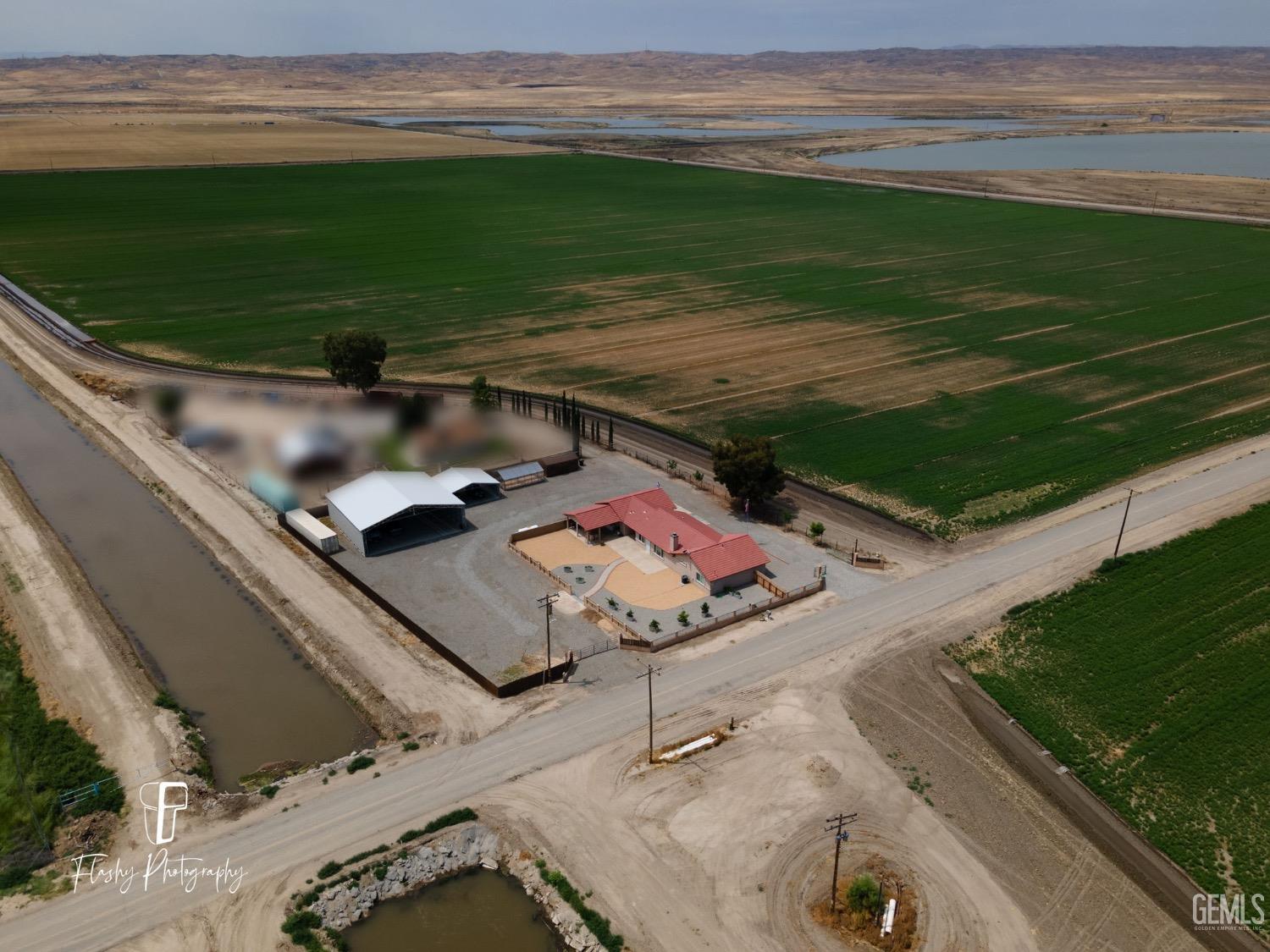 Undisclosed Address Buttonwillow, CA 93206 - Photo 65 of 65 a view of a swimming pool with a yard