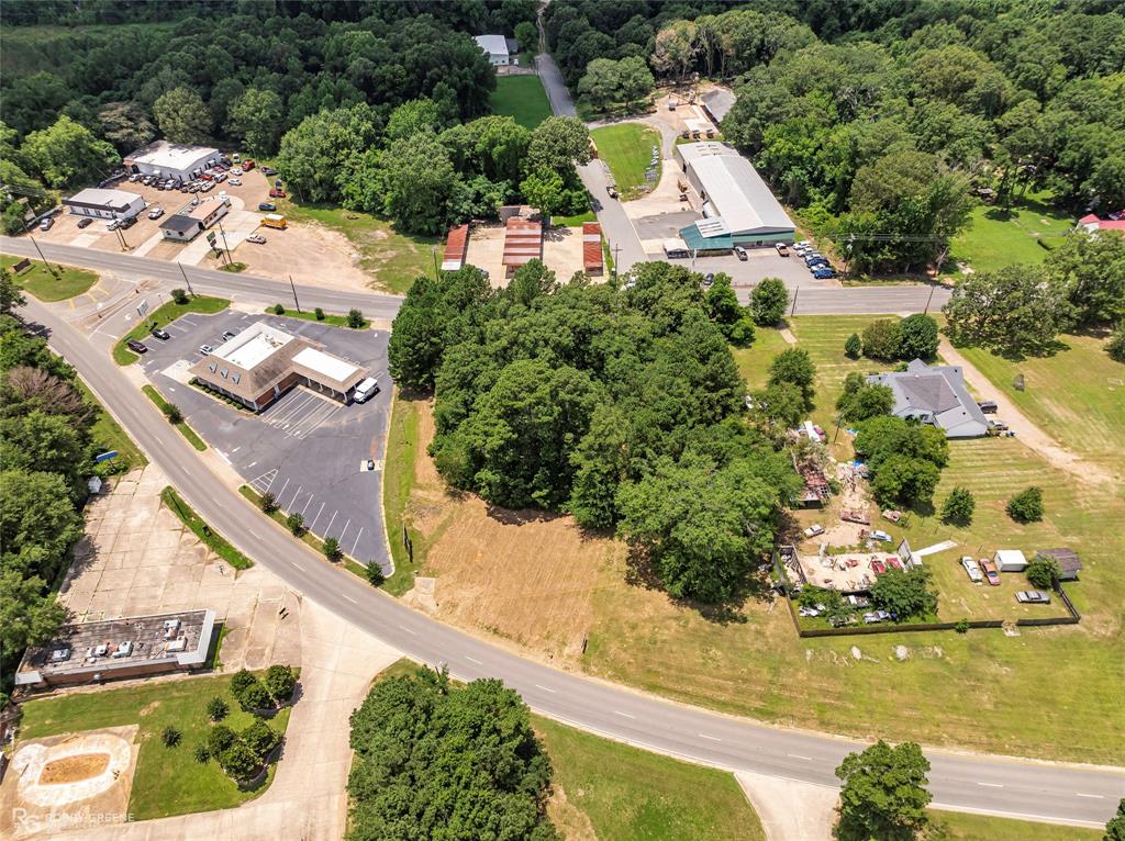 1312 Sibley Road Minden, LA 71055 - Photo 18 of 19 an aerial view of house with yard swimming pool and outdoor seating