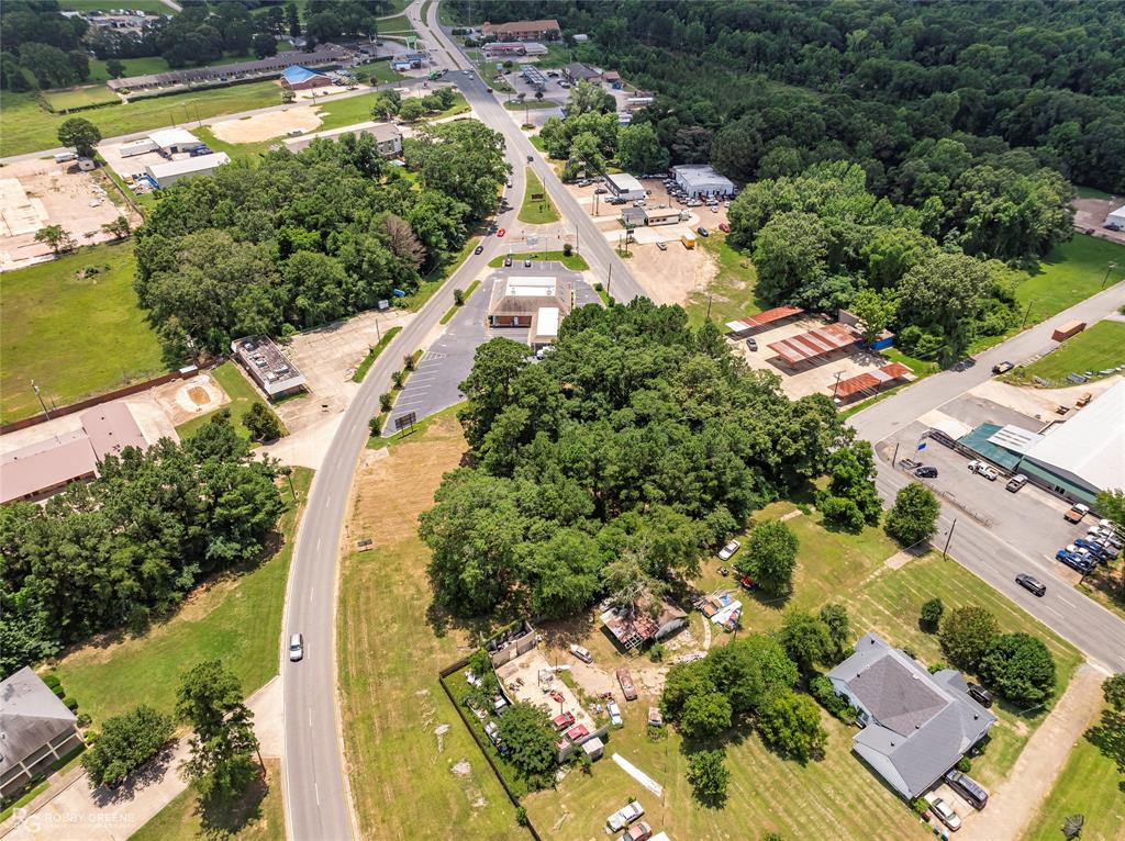 1312 Sibley Road Minden, LA 71055 - Photo 3 of 19 an aerial view of a house with a lake view