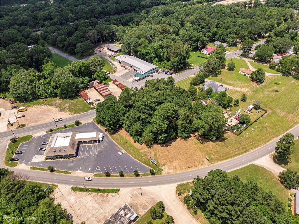 1312 Sibley Road Minden, LA 71055 - Photo 4 of 19 an aerial view of residential houses with outdoor space