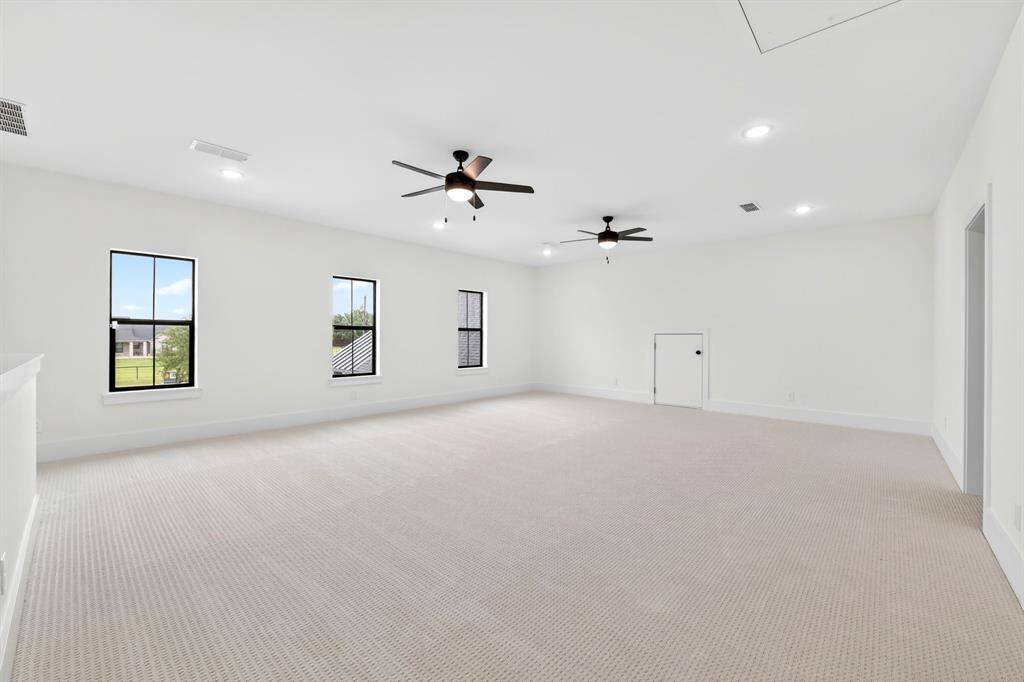 10373 Bobbie Lane Pilot Point, TX 76258 - Photo 27 of 40 Upstairs Flex room, Game room or additional large bedroom. Full size bath and closet so very functional extra space!