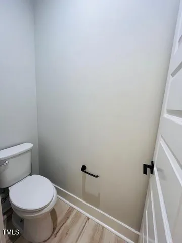 a bathroom with a toilet and a sink