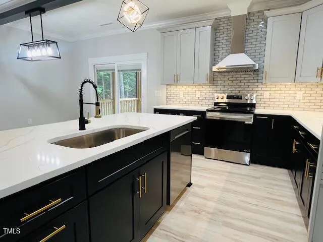 a kitchen with a sink and a stove