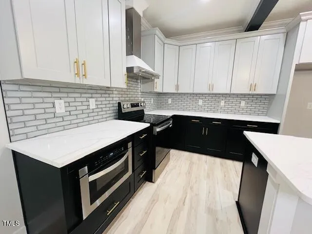 a kitchen that has a sink and a stove in it