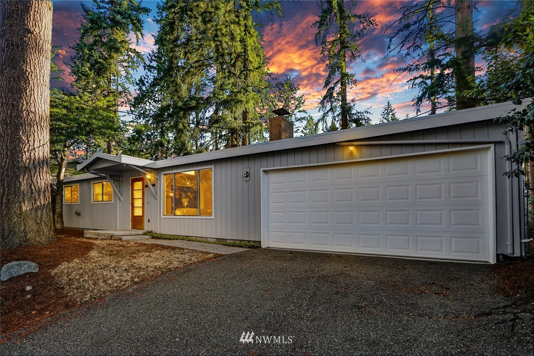 22229 17th Place West Bothell, WA 98021 - Photo 1 of 25 a view of house and tree