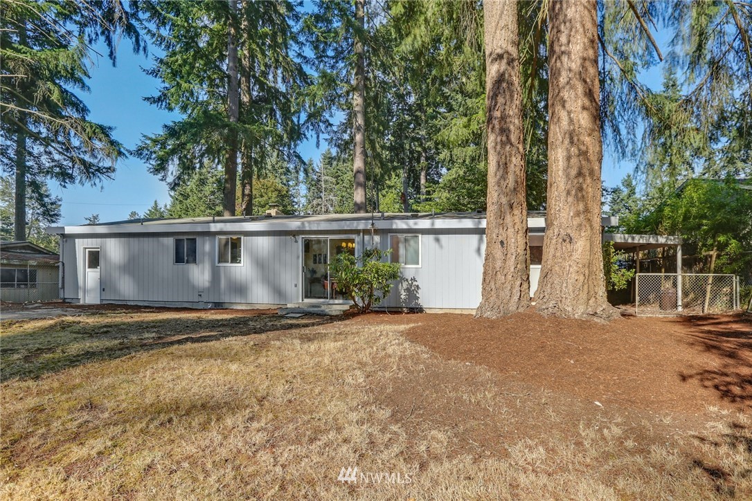 22229 17th Place West Bothell, WA 98021 - Photo 22 of 25 a view of a house with a yard