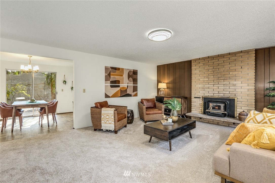 22229 17th Place West Bothell, WA 98021 - Photo 5 of 25 a living room with furniture and a fireplace
