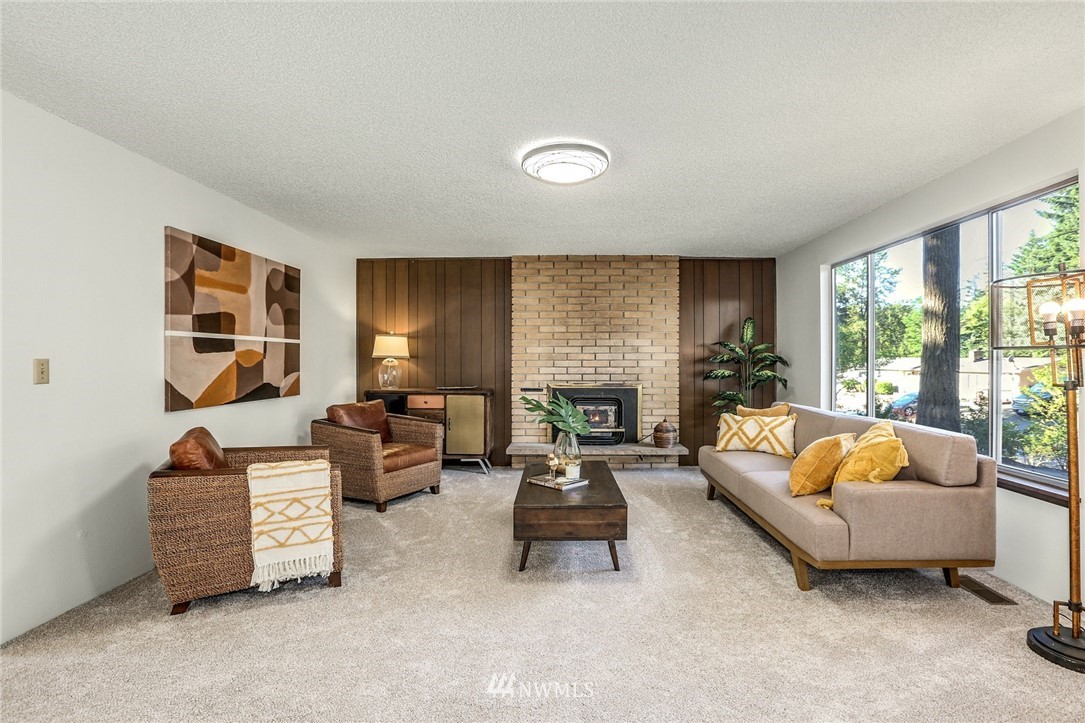 22229 17th Place West Bothell, WA 98021 - Photo 6 of 25 a living room with furniture and a flat screen tv