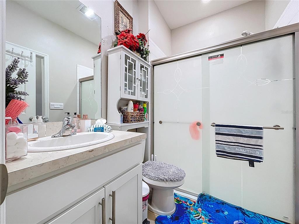 472 6th Avenue Northwest Ruskin, FL 33570 - Photo 36 of 96 a bathroom with a sink toilet and shower