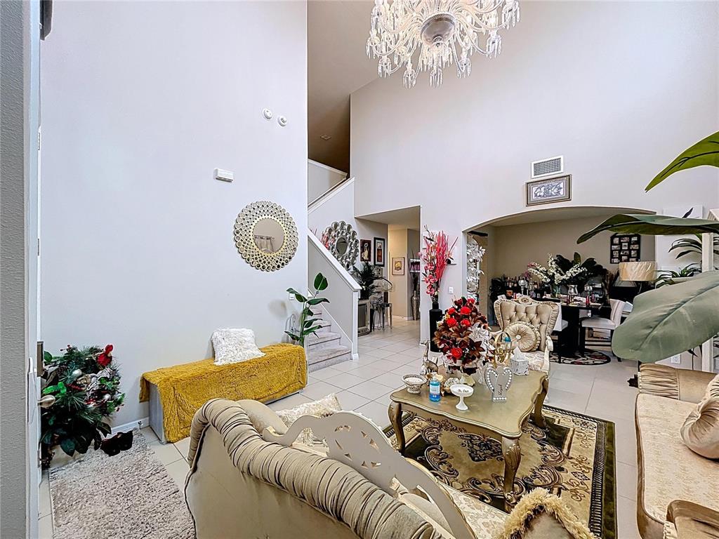 472 6th Avenue Northwest Ruskin, FL 33570 - Photo 8 of 96 a living room with furniture chandelier and a chandelier