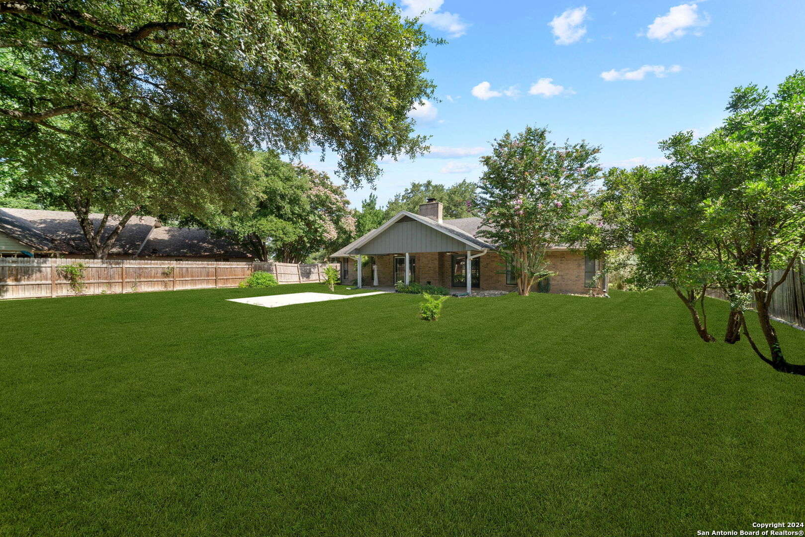 116 Bobwhite Trail Seguin, TX 78155 - Photo 20 of 23 a house view with a garden space