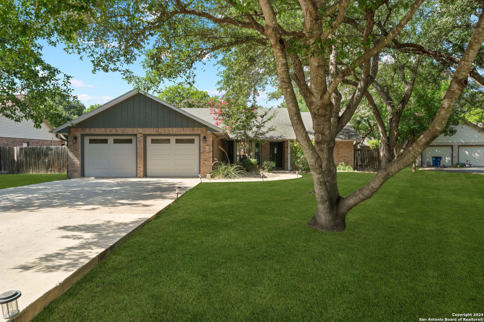 116 Bobwhite Trail Seguin, TX 78155 - Photo 2 of 23 a front view of house with yard and green space