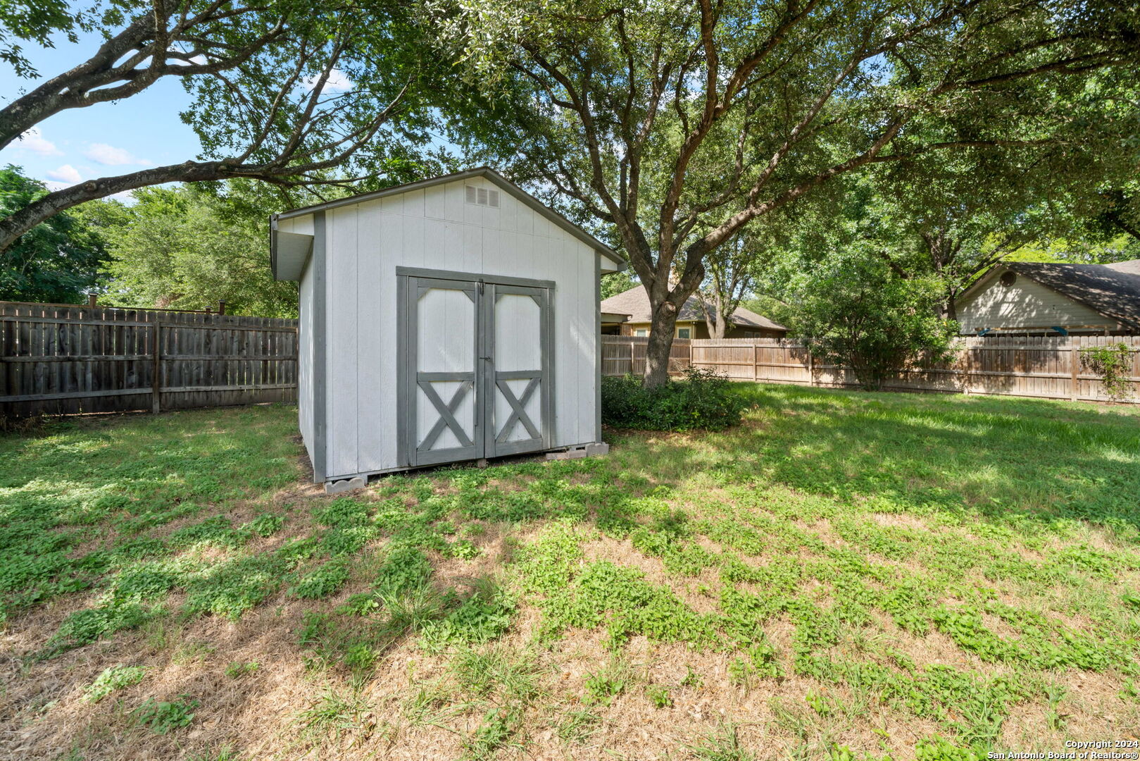 116 Bobwhite Trail Seguin, TX 78155 - Photo 21 of 23 a white house that has tree in front of it