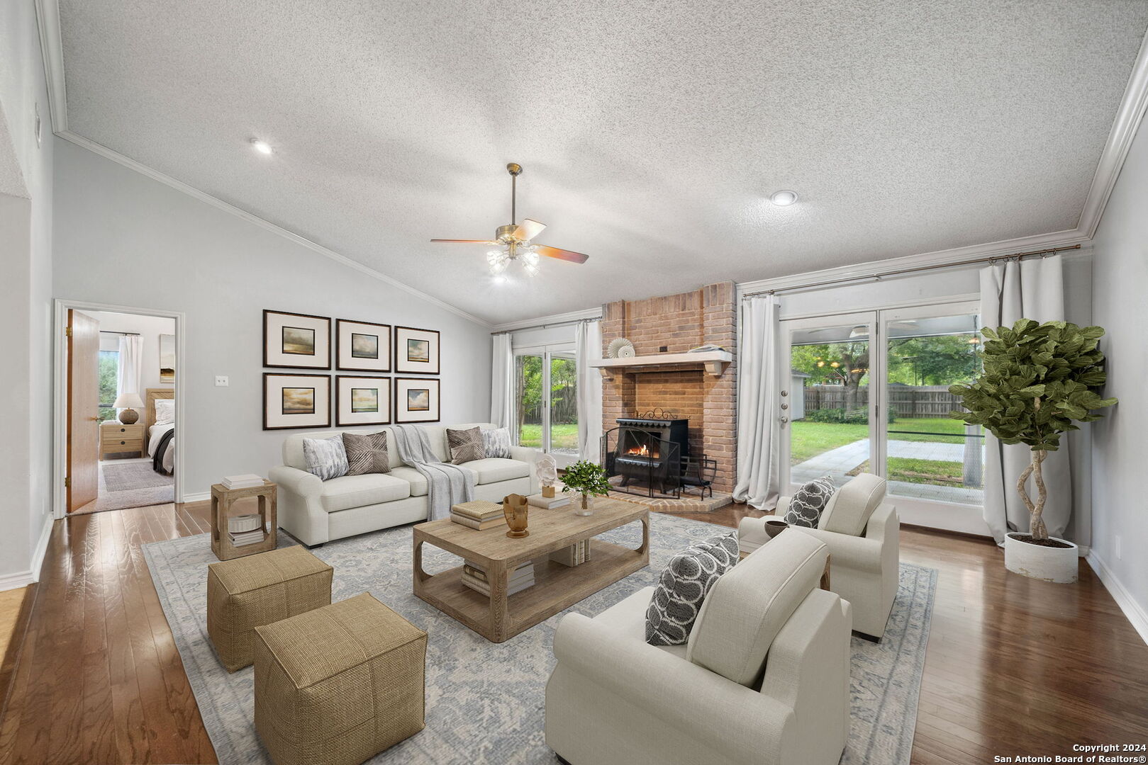 116 Bobwhite Trail Seguin, TX 78155 - Photo 3 of 23 a living room with furniture and a fireplace