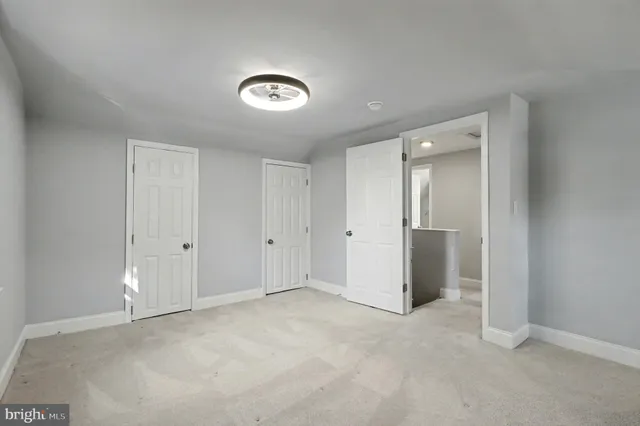 an empty room with a bathroom