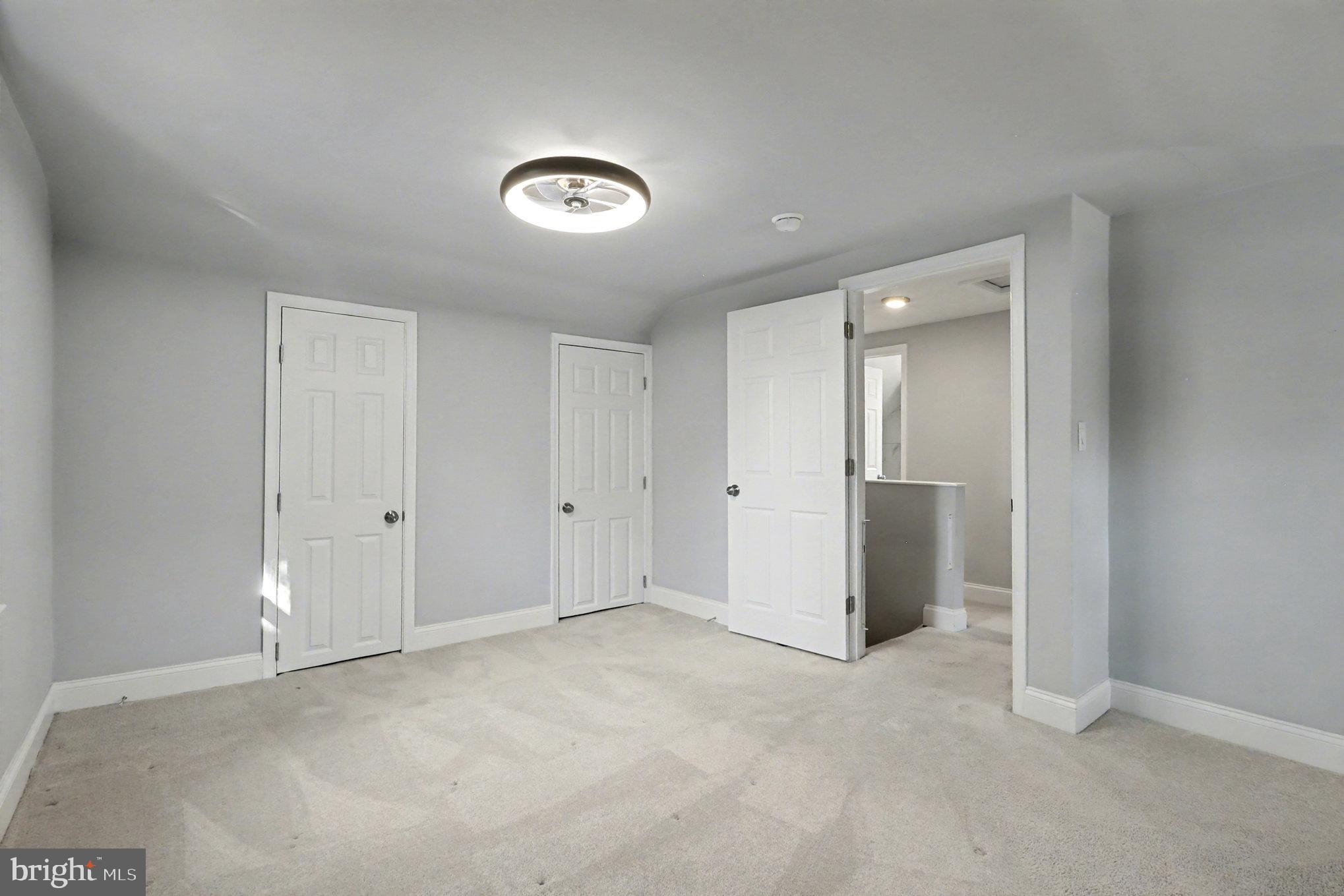 5406 Taylor Road Hyattsville, MD 20781 - Photo 13 of 26 an empty room with a bathroom