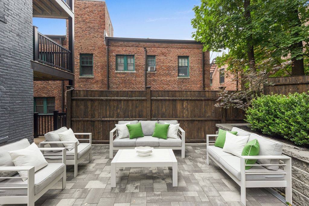 6 Claflin Road, Unit 2 Brookline, MA 02445 - Photo 31 of 39 a view of backyard with seating space