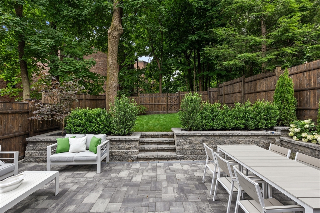 6 Claflin Road, Unit 2 Brookline, MA 02445 - Photo 34 of 39 a view of backyard with seating area and green space
