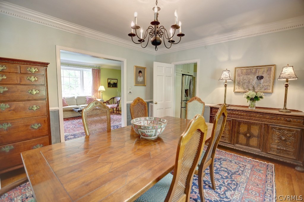 8908 Tolman Road Henrico, VA 23229 - Photo 20 of 30 Large dining room with heavy mouldings opens to li