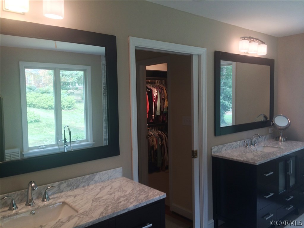 8908 Tolman Road Henrico, VA 23229 - Photo 24 of 30 Twin vanities with marble countertops