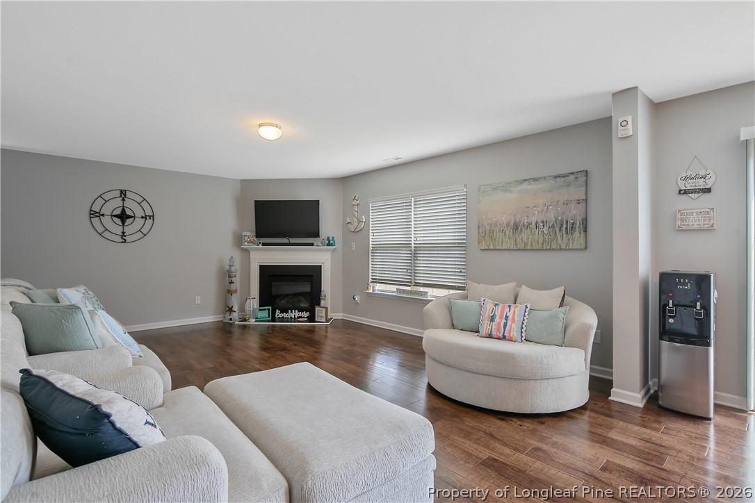 340 Battery Way Bunnlevel, NC 28323 - Photo 16 of 50 a living room with furniture and a fireplace