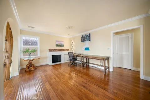 a view of a livingroom with furniture and a fireplace