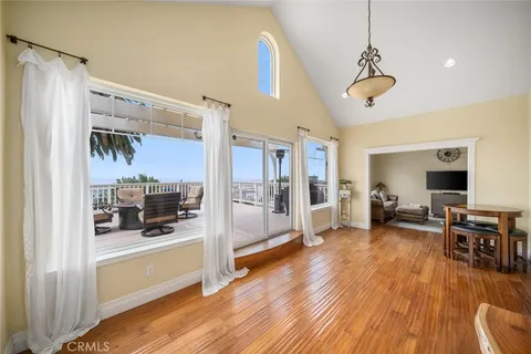 a view of a living room and hardwood floor