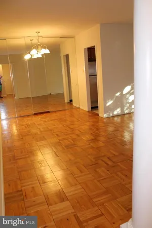a kitchen with a refrigerator and a sink